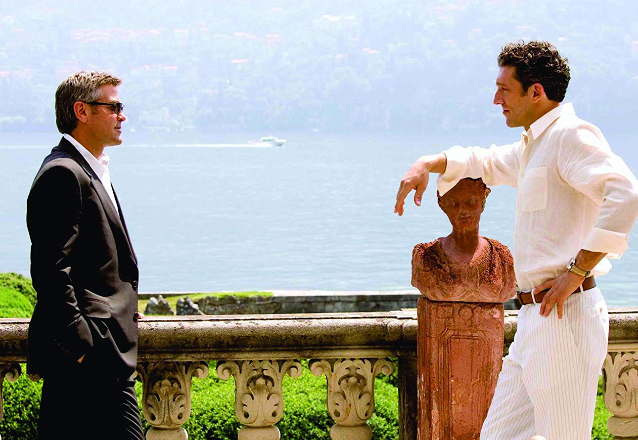 Picturesque lake backdrop with George Clooney and Vincent Cassel overlooking Lake Como, the scene from the film Ocean's Twelve